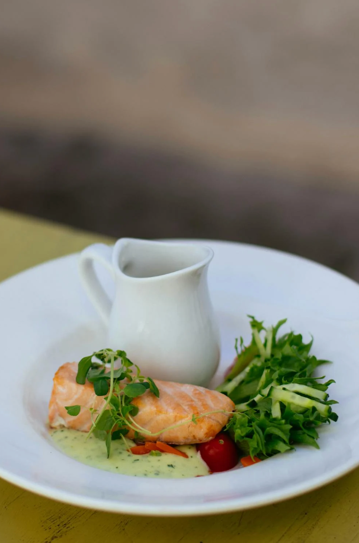 Mediterranean-Poached Salmon with Lemon-Parmesan Greens